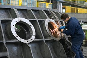 Image: man working on machine