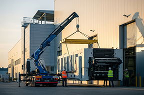 A factory finalizing an asset acquisition integrated with a CMMS system.