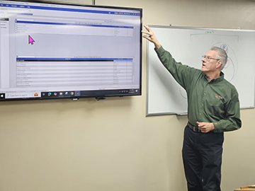 John Appel leads an in-house training session for MAPCON.