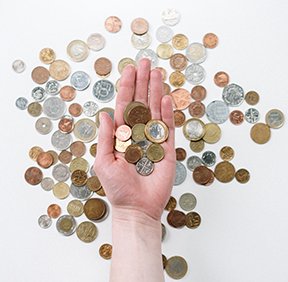 Image: hand with coins