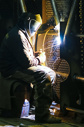 Image: man welding