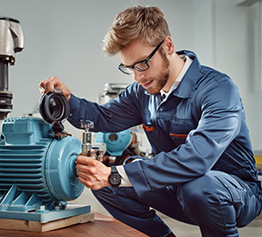 Image: maintenance technician on the job.