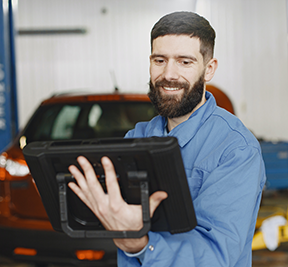 Image: man with computer tablet