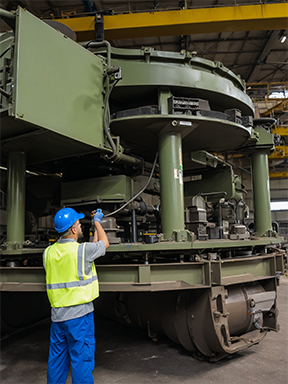 A technician conducting preventative maintenance to prevent equipment failure and extend lifespan.