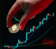 Hand holding a coin representing profit margin that affects return on assets.