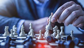 Image: man playing chess