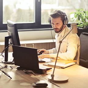 Image: man at computer